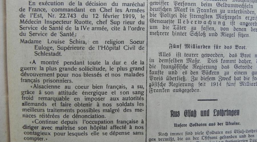 Hommage à Madame Louise Schira, Sœur Euloge, Supérieure à l’Hôpital Civil, qui a montré "le plus grand dévouement pour nos blessés, et nos malades français prisonniers" et une ténacité sans faille envers l'ennemi. 