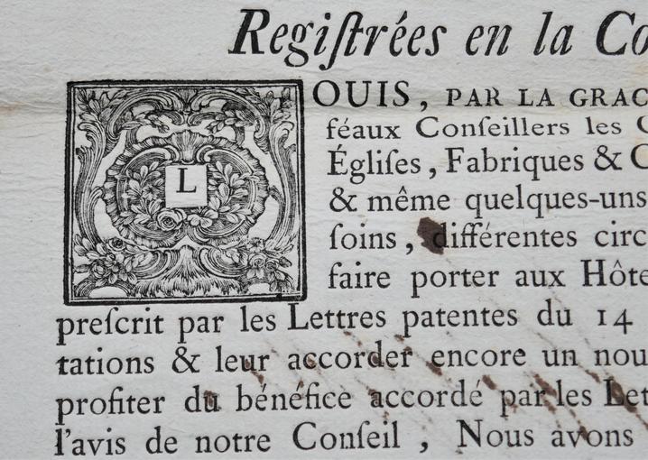 Extrait d'un correspondance du Roi (AA185 - 1760/1777). La lettrine imprimée représente la lettre L, dans une forme plus minimaliste.